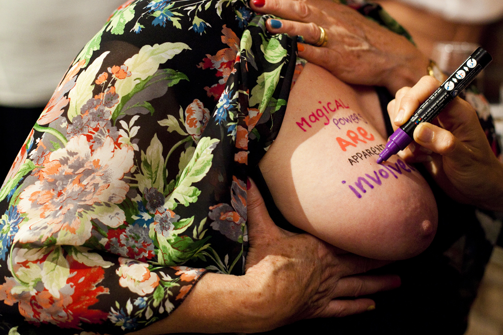Natascha pen tattoos Anne during Agent Provocateur at Anna Pappas Gallery, Melbourne 2012, photo by Kim Liddle