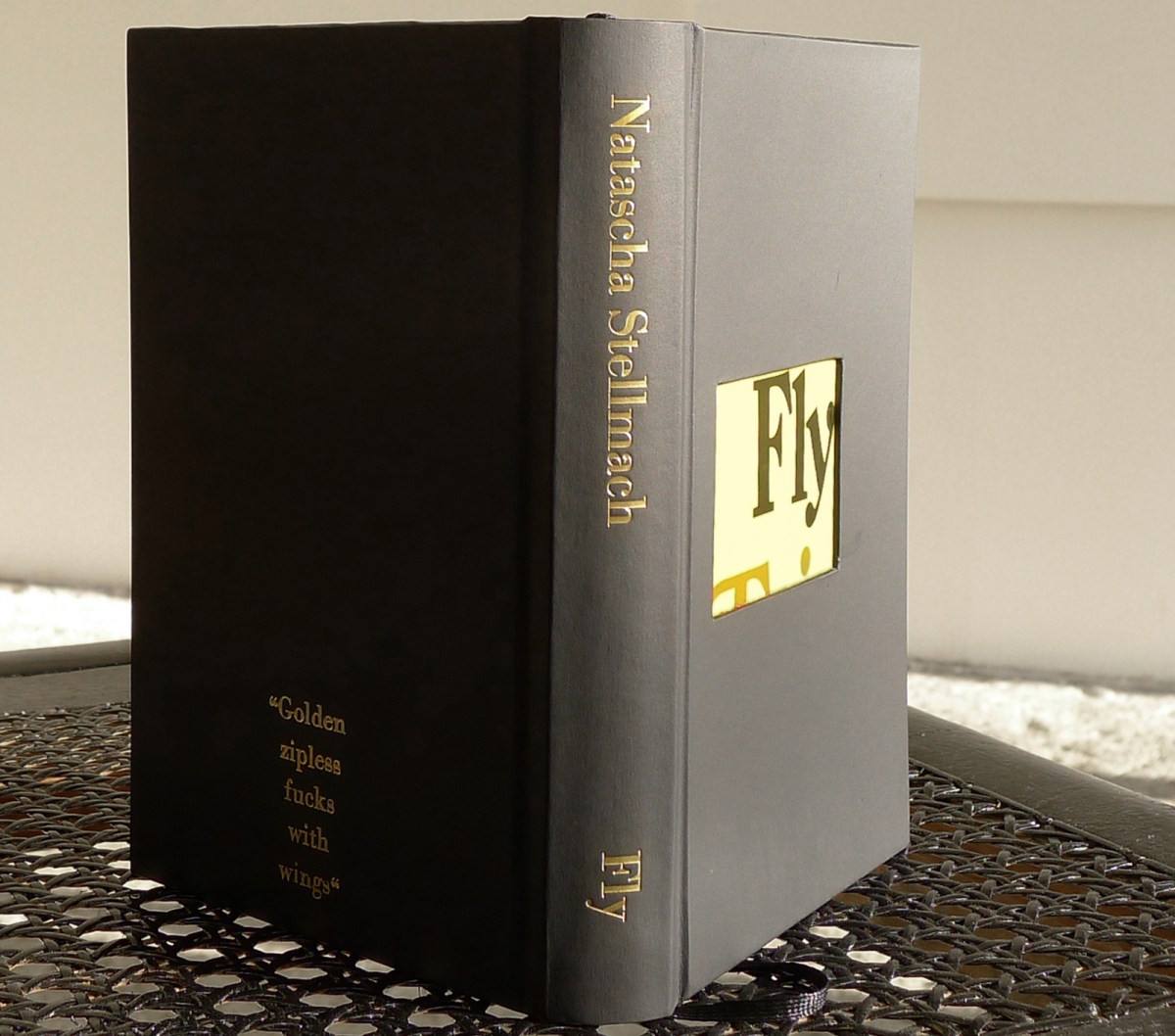 Natascha Stellmach, Installation view, Fly, remodelled chair and 300p hand-bound artist book: pen, ink & pencil on paper, ribbon, matte cover paper with embossing, 18 x 11 x 3 cm, unique piece, at Wagner+Partner Berlin, 2012