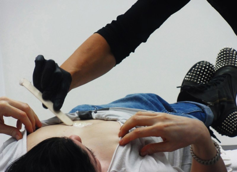 Natascha Stellmach and a participant during an inkless tattoo happening at Wagner+Partner Berlin, 2013, photo by Deb Wargon