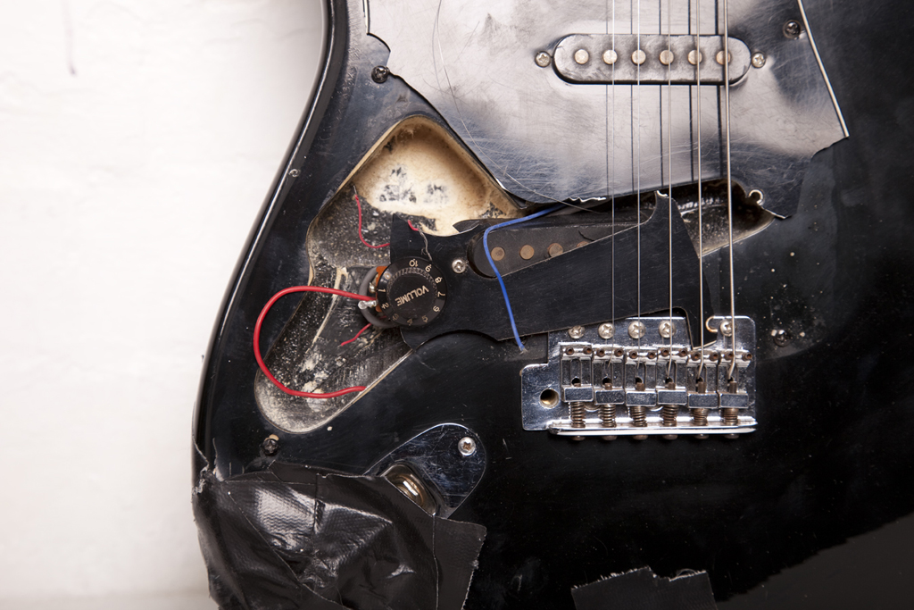 Commodity, (detail), 2009, smashed left-handed 1980s guitar and amp lead, 100 x 33 x 4 cm