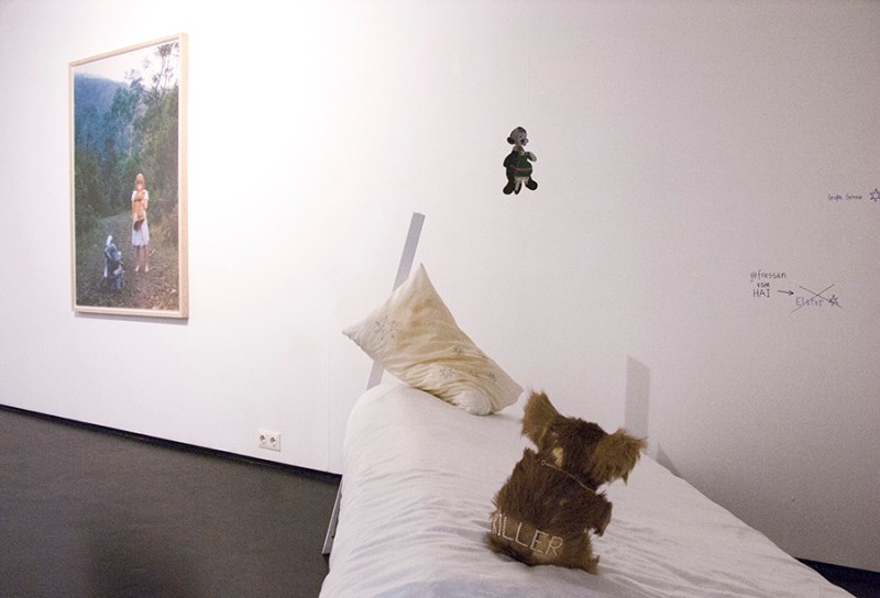 © Natascha Stellmach, Installation view (detail): The Book of Back, mixed media, video (Oi Oi Oi), framed photo (Secret #5), Fotogalerie Wien, Austria, 2010