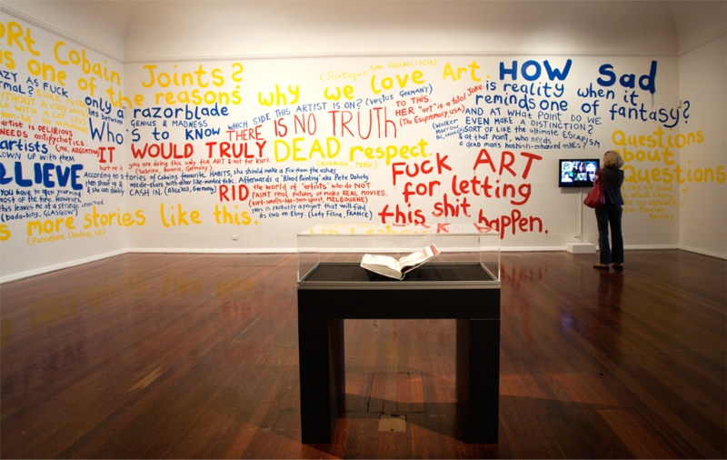 Installation view: Whatever Happened to Painting?, (wall text), "Rape Me" (artist book), Overture (1-channel video), PICA, Australia, 2010, photo by Bewley Shaylor