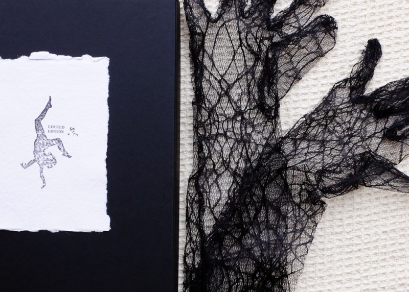 Natascha Stellmach, The Book of Back (detail), offset printing on paper, thread, photograph, DVD, linen, box, faux grass, gloves, limited ed. 123, 2007